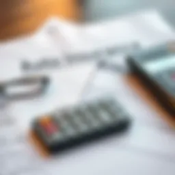 Car insurance policy documents with a calculator